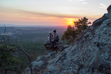 Couple on top of mountain during sunset - 224934524