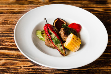 chic delicious steak with vegetable garnish