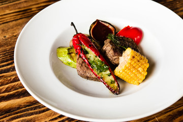 chic delicious steak with vegetable garnish