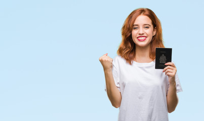 Young beautiful woman holding passport of canada over isolated background screaming proud and celebrating victory and success very excited, cheering emotion