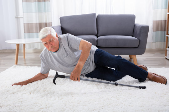 Senior Man Fallen On Carpet