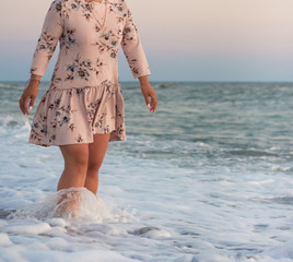woman walking on the beach