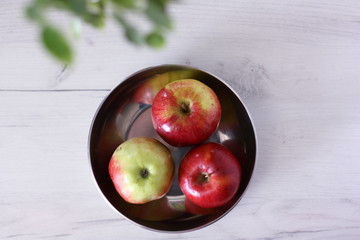 Red apples on a white background