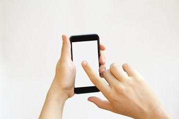 Hand touching smartphone blank screen, isolated on white background.
