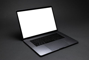 Laptop Computer Mockup at Angle on a Dark Gray Background
