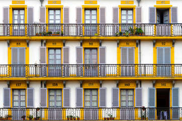 detail a building with yellow windows