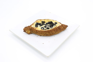 Fried breaded chicken fillet in white cardboard box isolated on white background