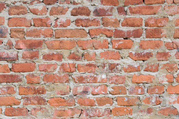 Old red brick wall texture grunge background. may use to interior design