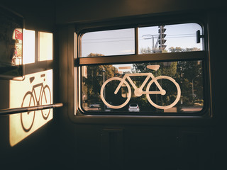 Fototapeta premium sticker of a bike on a train window