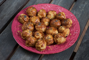 National Azerbaijanian cuisine Gogal on plate on wooden table background,close-up, top view