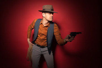 cowboy with a pistol, a gold miner adventure guy in a hat with a gun,