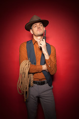cowboy with a pistol, a gold miner adventure guy in a hat with a gun,