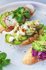 bruschetta with lettuce, vegetables and cheese