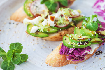 bruschetta with lettuce, vegetables and cheese
