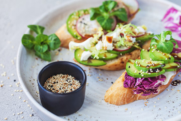 bruschetta with lettuce, vegetables and cheese