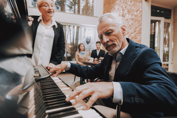 Elderly Man. Plays the Piano. Nursing Home. Smile