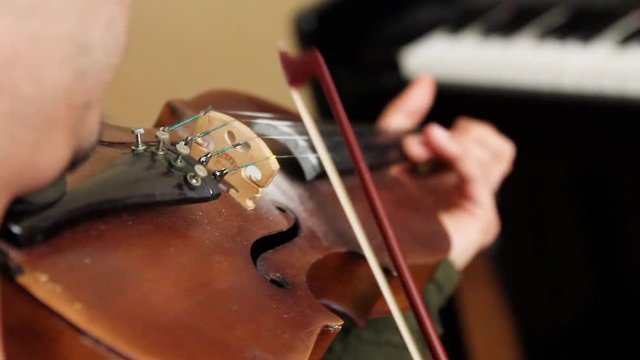violin playing and detail