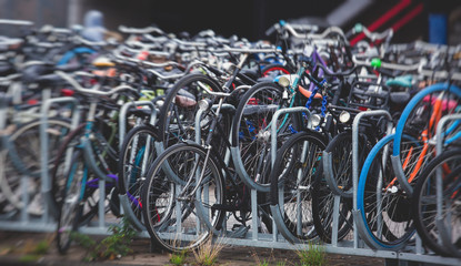 Fototapeta na wymiar Parking of bicycles in Amsterdam, near Amsterdam Centraal railway station
