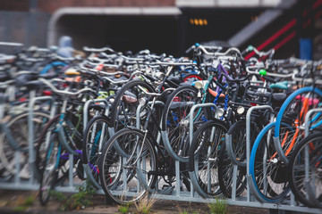 Fototapeta na wymiar Parking of bicycles in Amsterdam, near Amsterdam Centraal railway station