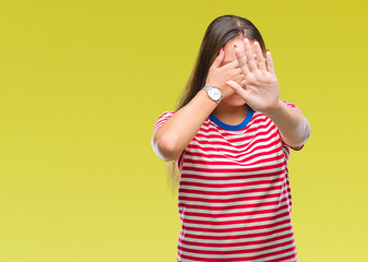 Young caucasian beautiful woman over isolated background covering eyes with hands and doing stop gesture with sad and fear expression. Embarrassed and negative concept.