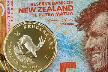 Search Photos Krugerrand A Macro Image Of Five New Zealand Dollar Bill With Golden Krugerrand One Ounce