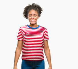 Young afro american woman over isolated background with a happy and cool smile on face. Lucky person.