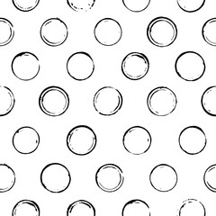 Seamless pattern with hand drawn line circles.