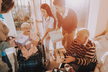 Birthday Party. Elderly Woman. Guest. Celebration.