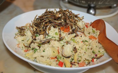 Fried rice, vegetable salad and small fish or anchovy is one of the favorite dishes in Southeast Asia.