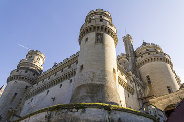 Medieval castle of Pierrefonds, Picardy, France. Exterior with crenelations and turrets