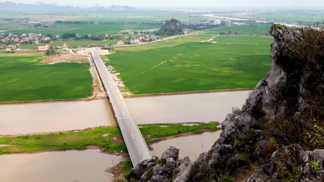 Landscape in Ninh Binh with bridge road, Vietnam timelapse