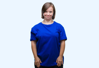 Fototapeta premium Young adult woman with down syndrome over isolated background with a happy and cool smile on face. Lucky person.