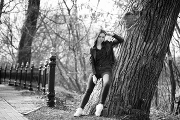 Girl on a walk through the spring city