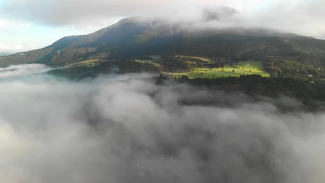 Flying above the clouds at lake Ashi and looking at mount Fuji, Hakone, Japan