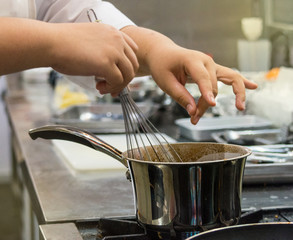 Chef preparing food, meal, in the kitchen, chef cooking, Chef decorating dish, closeup, .chef at work.