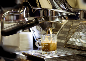 Barista working in a coffee shop, Close up of barista presses ground coffee using tamper, Barista Make Coffee Portafilter Concept