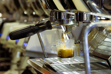 Barista working in a coffee shop, Close up of barista presses ground coffee using tamper, Barista Make Coffee Portafilter Concept
