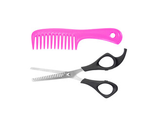 hairdressing scissors and comb isolated on white