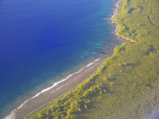 Obraz na płótnie Canvas Aerial view of Tinian coastline, Northern Mariana Islands 