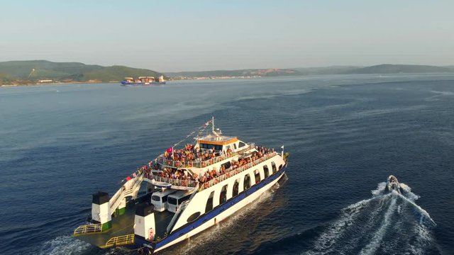 Aerial view of passenger ferry boat in open waters in Canakkale - Turkey.