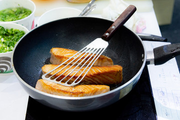Cooking Salmon steak with pan, frying Salmon Steak
