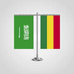 Table stand with flags of Saudi Arabia and Bolivia.Two flag. Flag pole. Symbolizing the cooperation between the two countries. Table flags