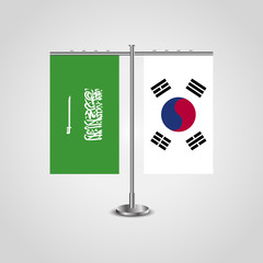 Table stand with flags of Saudi Arabia and South Korea.Two flag. Flag pole. Symbolizing the cooperation between the two countries. Table flags