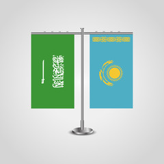 Table stand with flags of Saudi Arabia and Kazakhstan.Two flag. Flag pole. Symbolizing the cooperation between the two countries. Table flags
