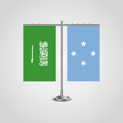 Table stand with flags of Saudi Arabia and Micronesia.Two flag. Flag pole. Symbolizing the cooperation between the two countries. Table flags