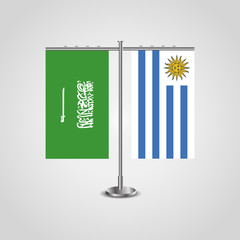 Table stand with flags of Saudi Arabia and Uruguay.Two flag. Flag pole. Symbolizing the cooperation between the two countries. Table flags