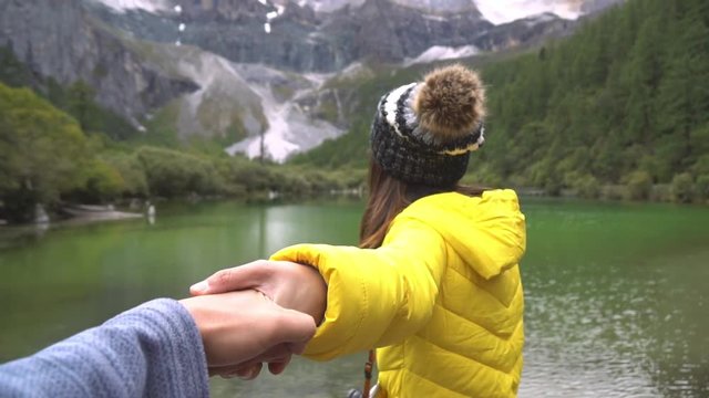 Hiking young couple traveler looking beautiful landscape at Yading Nature Reserve, Travel lifestyle concept