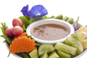 Thai cuisine nam prik or chili paste mixes with fish serves with various vegetables