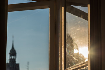 The scratched old box window in the old building