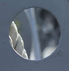 rope in the circle hole on the war ship